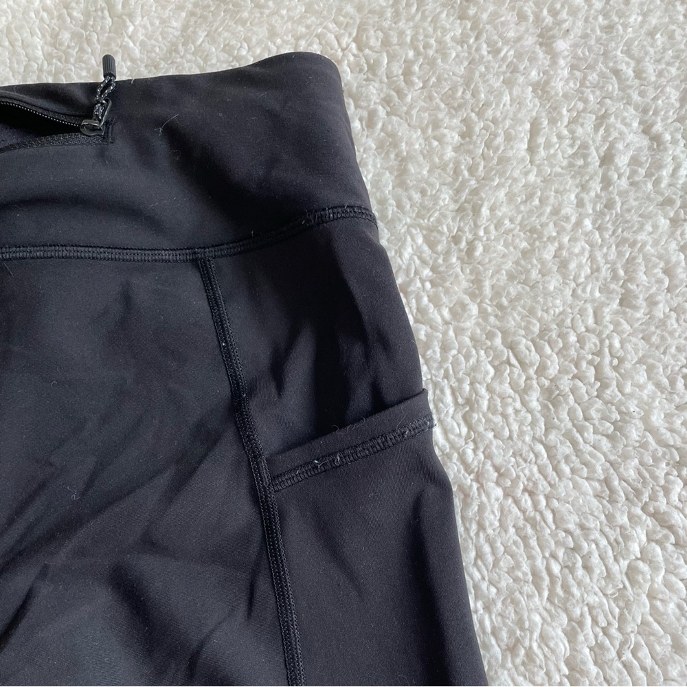 Lululemon Black Scalloped Hem Reflective Tight Stuff Pants - Picture 3 of 6